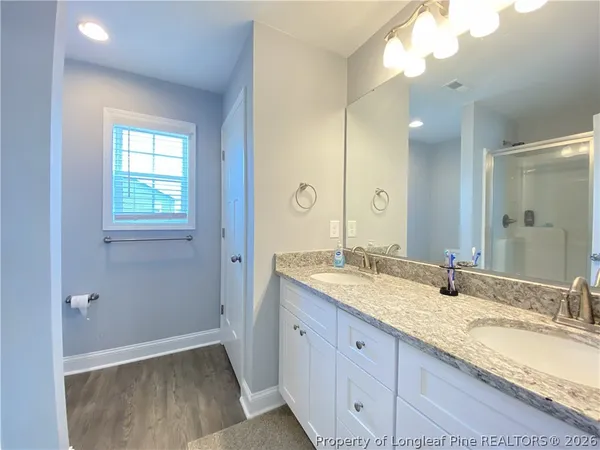 a view of wooden deck and city view