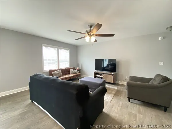 a kitchen with stainless steel appliances a refrigerator and a stove top oven