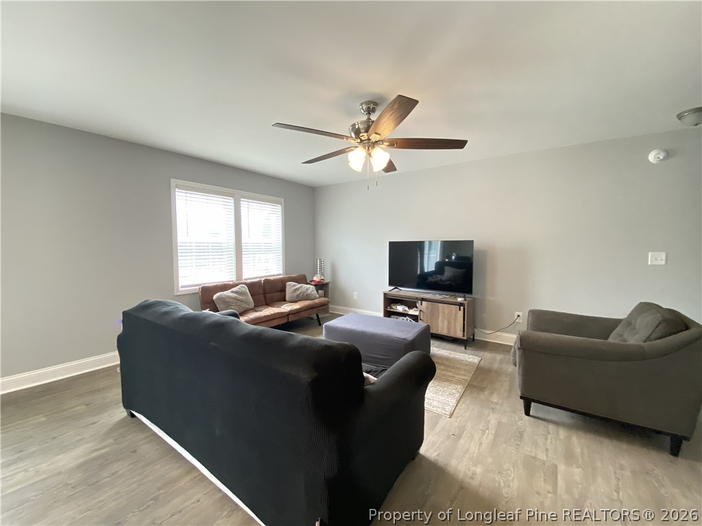 900 Allstar Avenue Cameron, NC 28326 - Photo 3 of 17 a living room with furniture and a flat screen tv