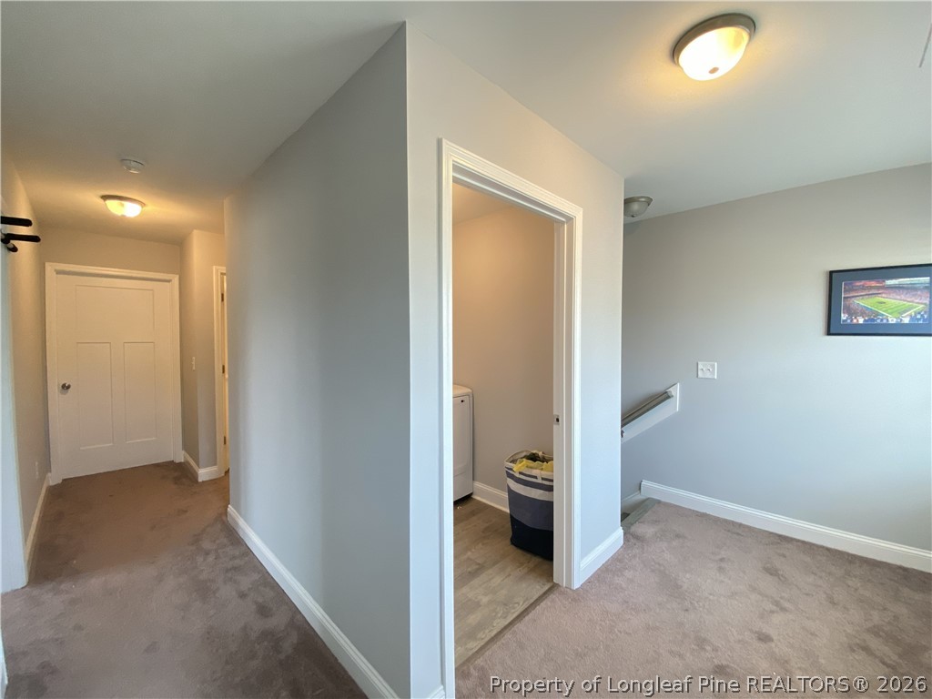 900 Allstar Avenue Cameron, NC 28326 - Photo 7 of 17 a view of a hallway with a livingroom and a bathroom