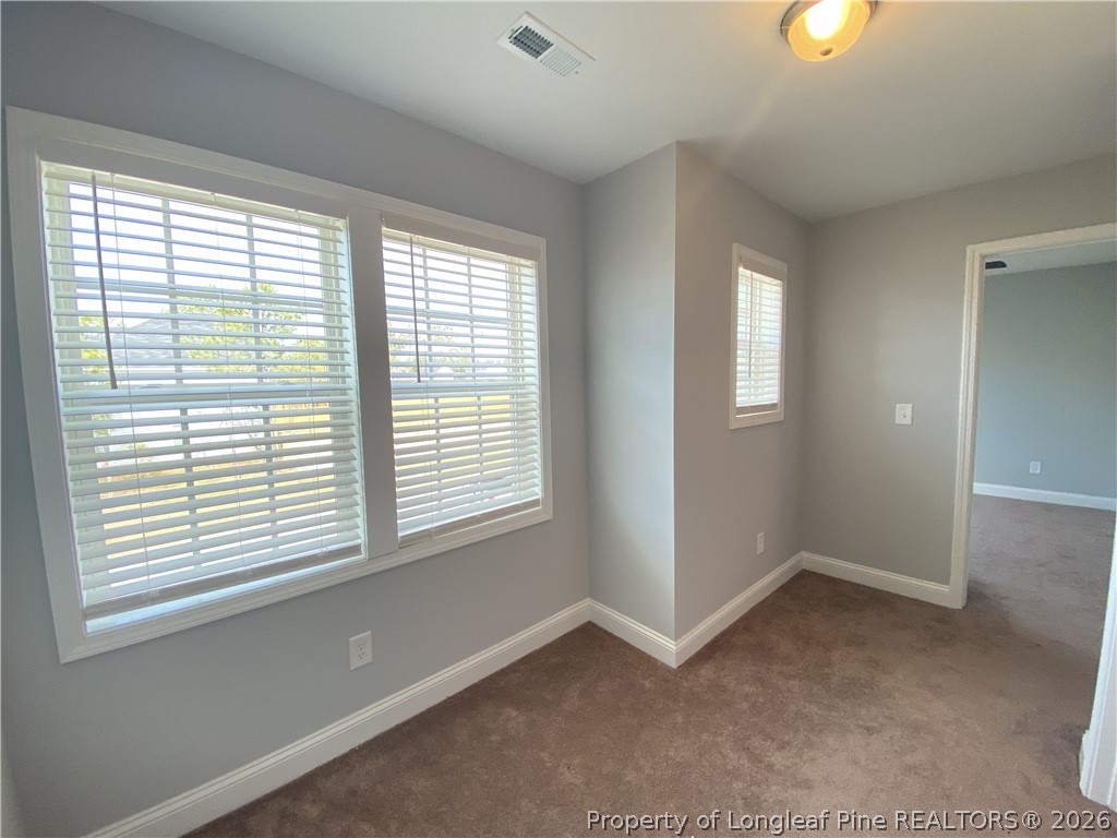 900 Allstar Avenue Cameron, NC 28326 - Photo 8 of 17 a view of an empty room with a window