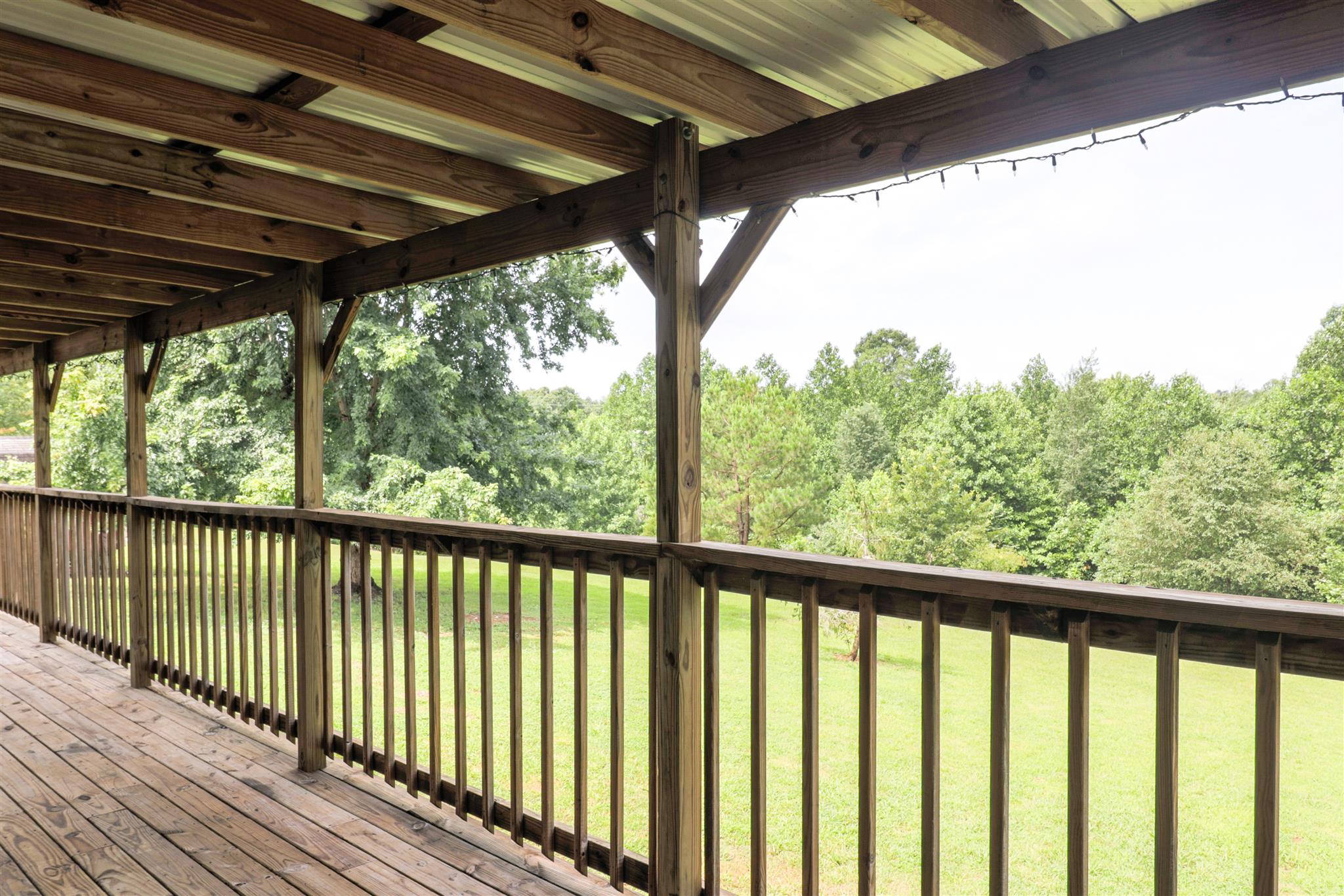 3268 Mobley Ridge Road Duck River, TN 38454 - Photo 14 of 19 Relax rain or shine on this beautiful, covered back porch overlooking private backyard