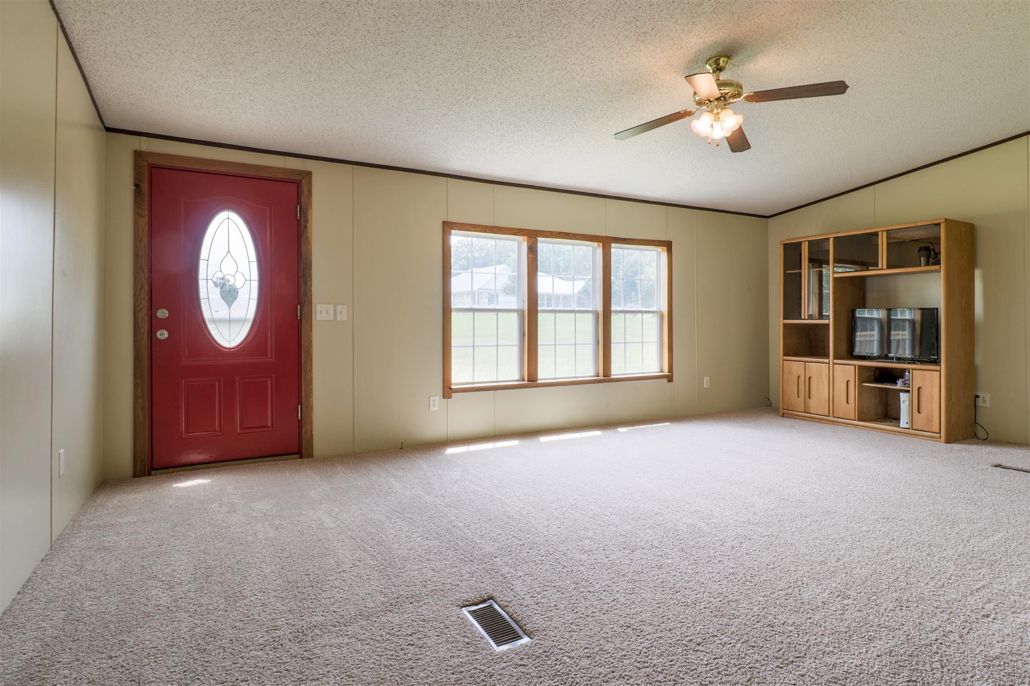 3268 Mobley Ridge Road Duck River, TN 38454 - Photo 2 of 19 Huge front room with plenty of natural lighting