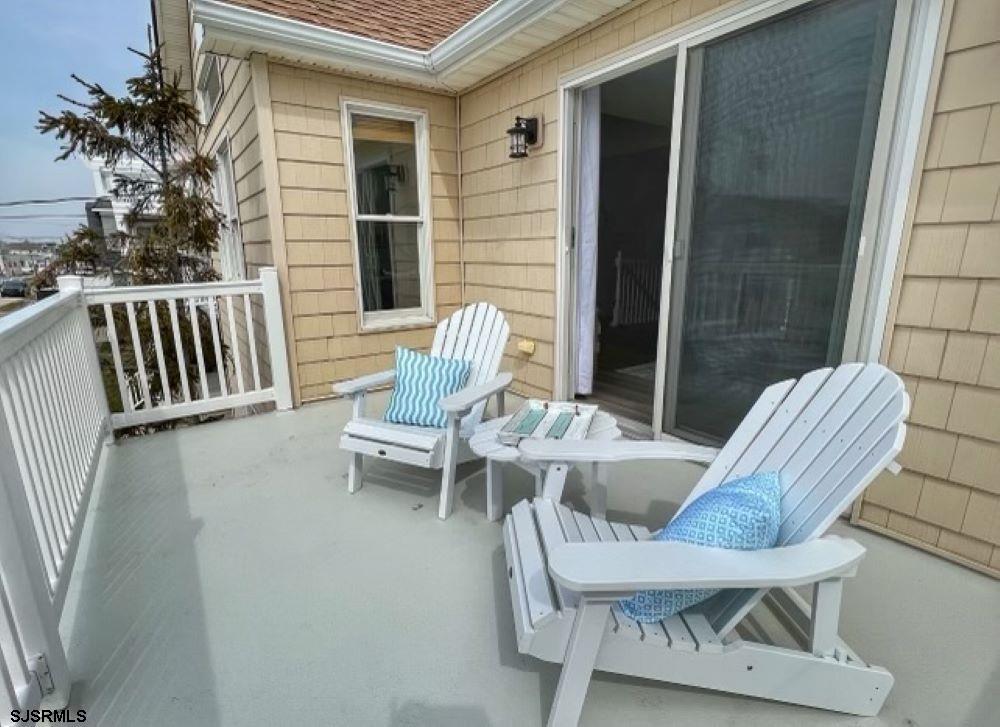 337 12th Street South Brigantine, NJ 08203 - Photo 18 of 36 a view of balcony with couple of chairs