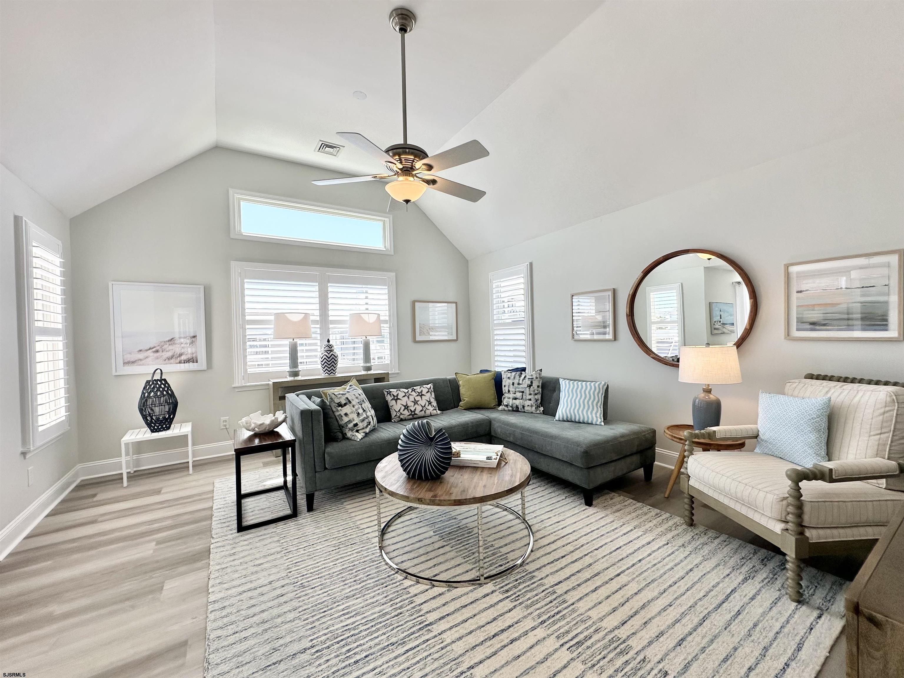 337 12th Street South Brigantine, NJ 08203 - Photo 20 of 36 a living room with furniture and a large window