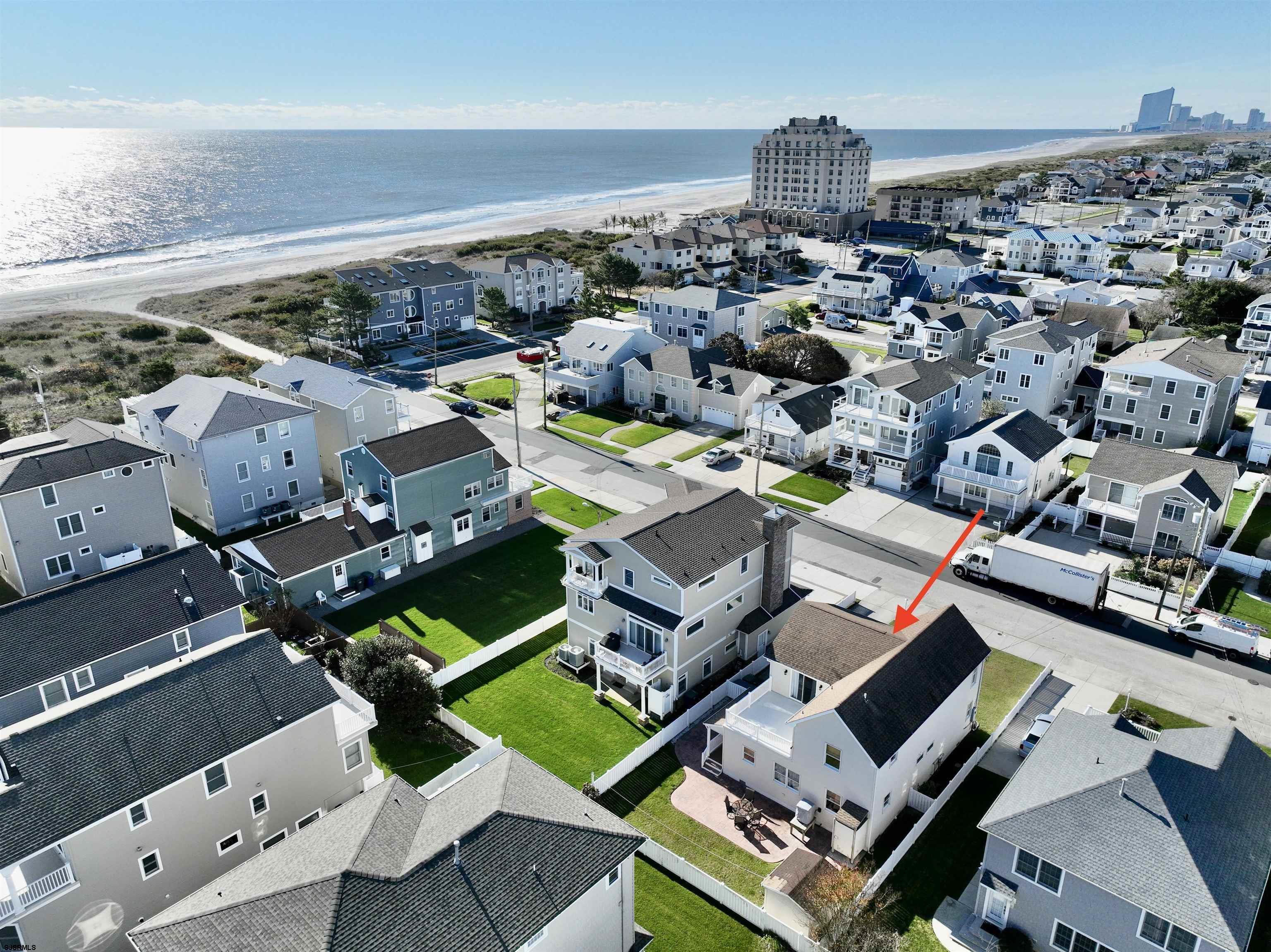 337 12th Street South Brigantine, NJ 08203 - Photo 3 of 36 an aerial view of a house with a ocean view