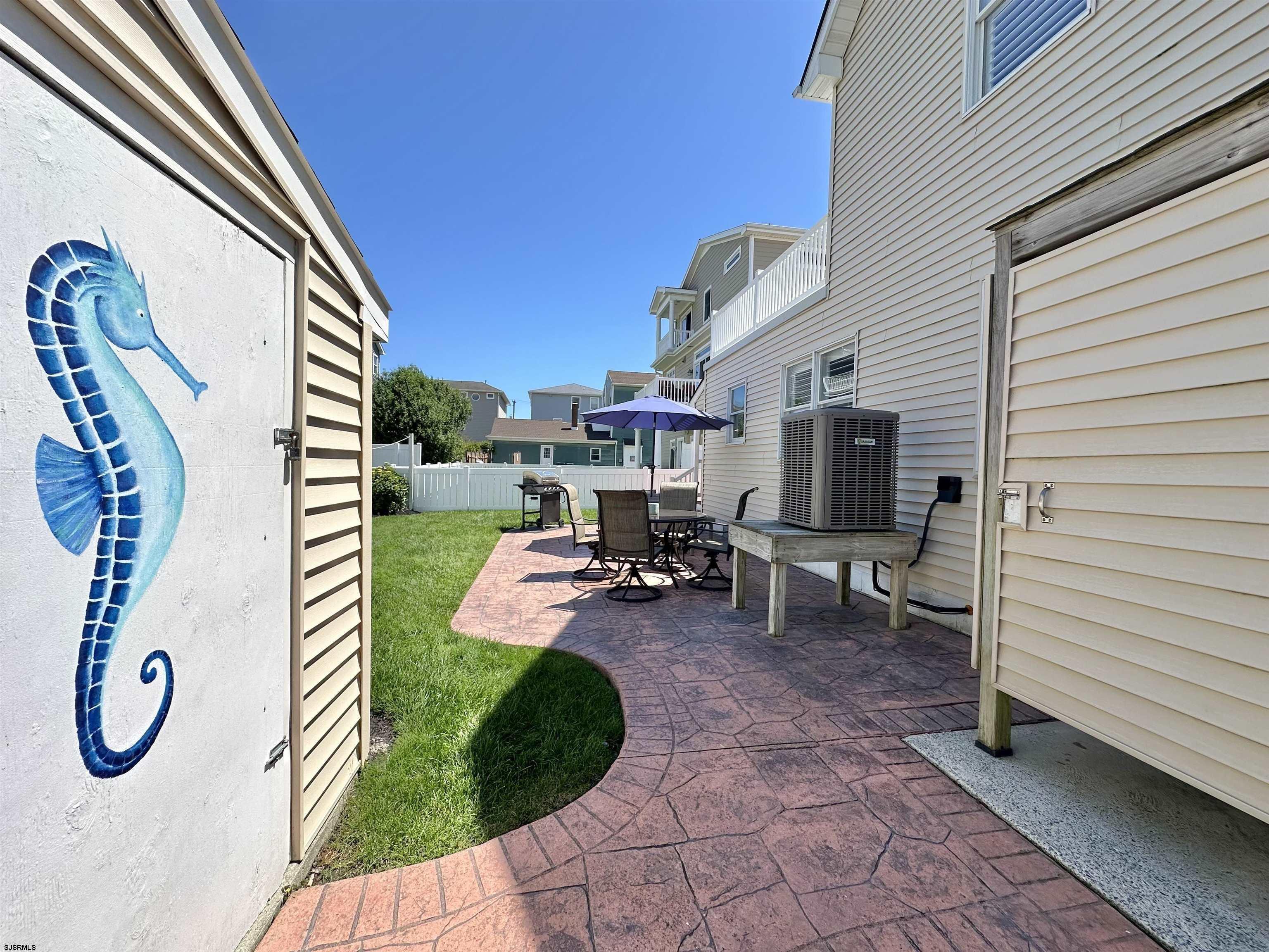 337 12th Street South Brigantine, NJ 08203 - Photo 31 of 36 a view of swimming pool with outdoor seating