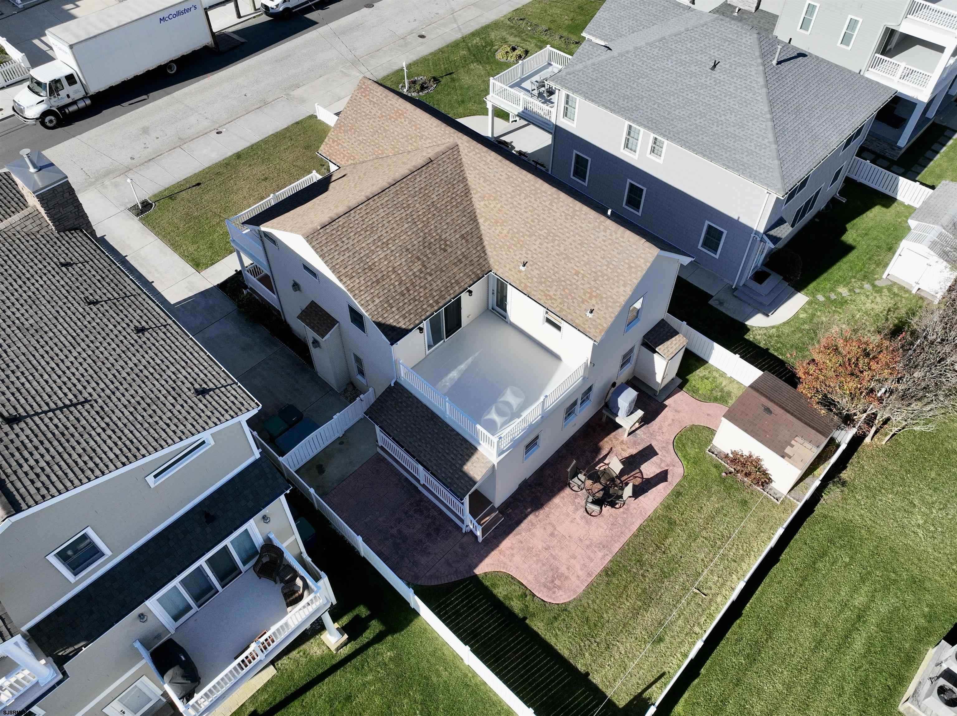 337 12th Street South Brigantine, NJ 08203 - Photo 32 of 36 an aerial view of a house with a garden
