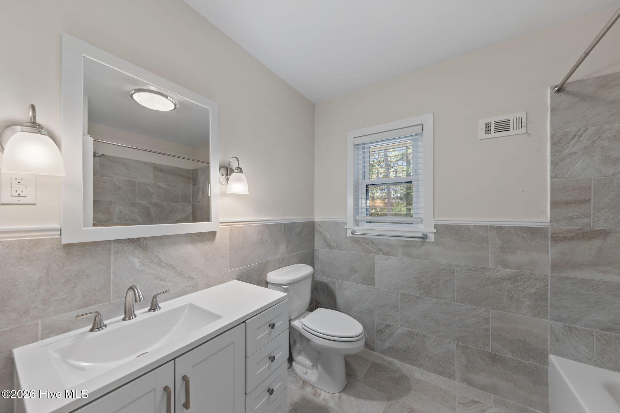1010 Bion Butler Road Aberdeen, NC 28315 - Photo 28 of 62 New tile work in the primary suite's bathroom