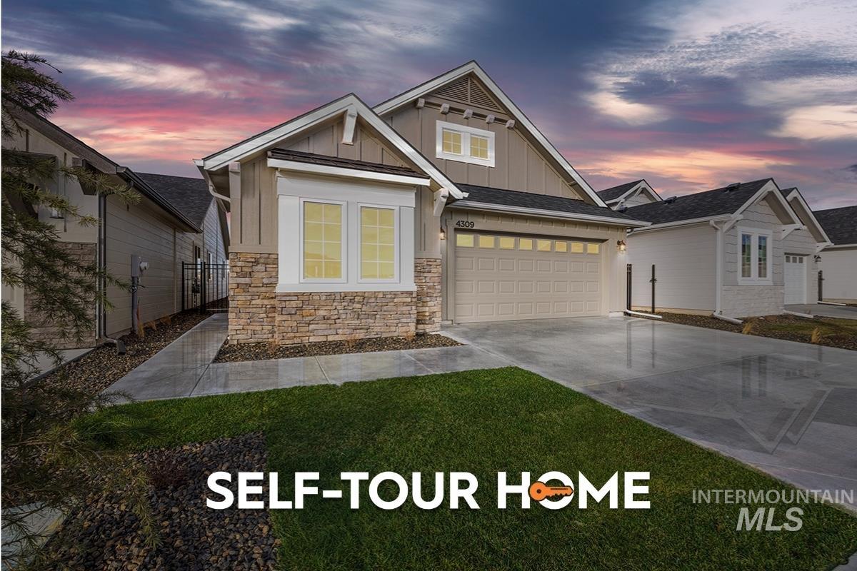 Craftsman inspired home with board and batten siding, a garage, concrete driveway, and stone siding