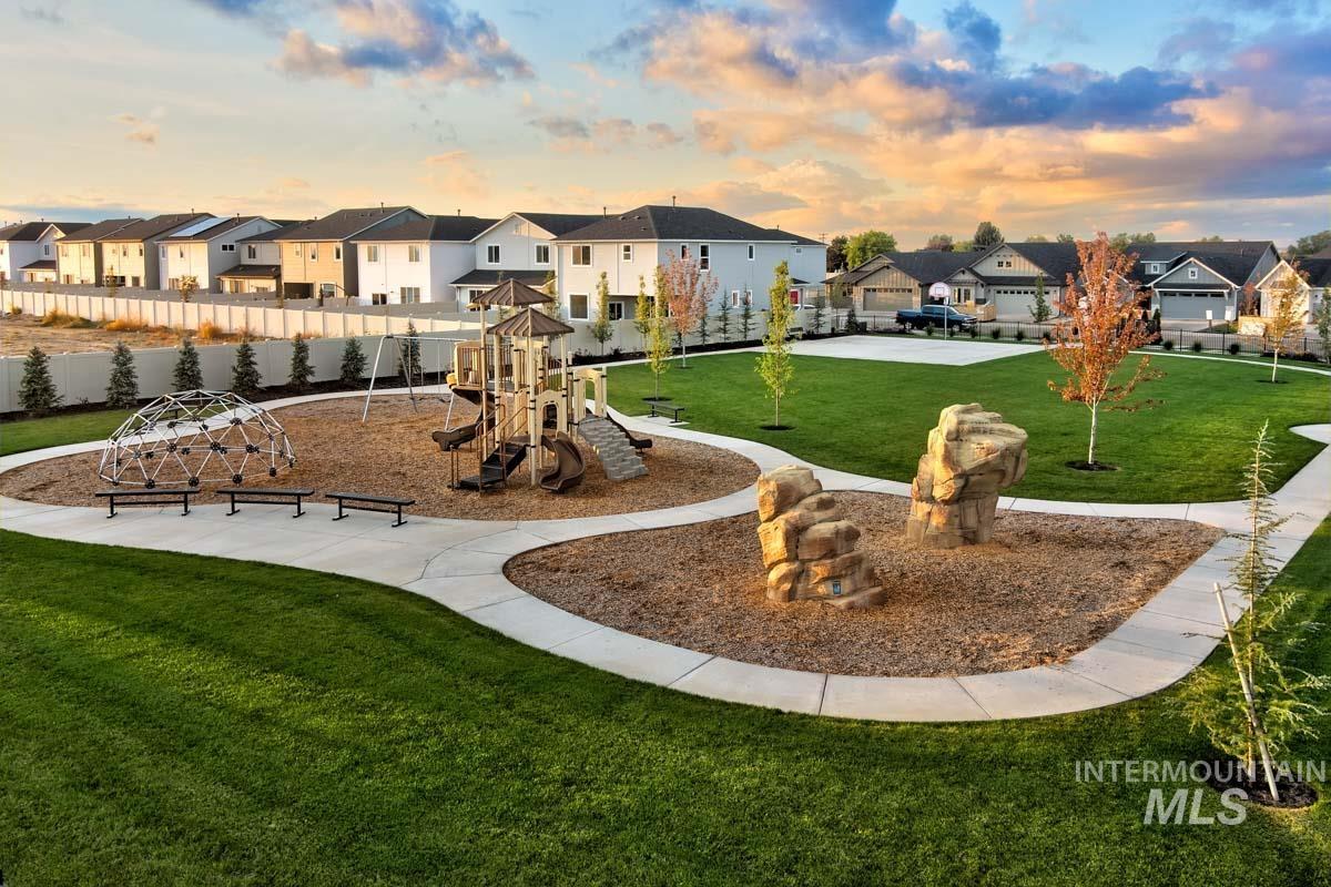 4309 South Zocalo Way Meridian, ID 83642 - Photo 26 of 26 Playground at dusk featuring a residential view and a patio
