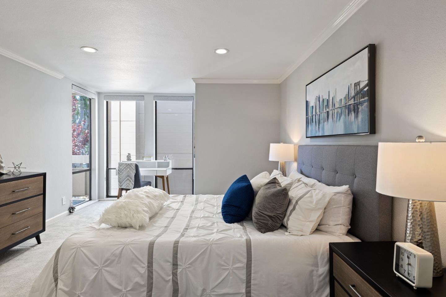 1171 Compass Lane, Unit 216 Foster City, CA 94404 - Photo 20 of 35 a bedroom with a bed and a lamp on dresser