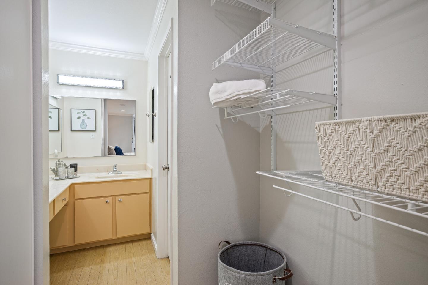 1171 Compass Lane, Unit 216 Foster City, CA 94404 - Photo 23 of 35 a bathroom with a granite countertop sink a toilet and a mirror