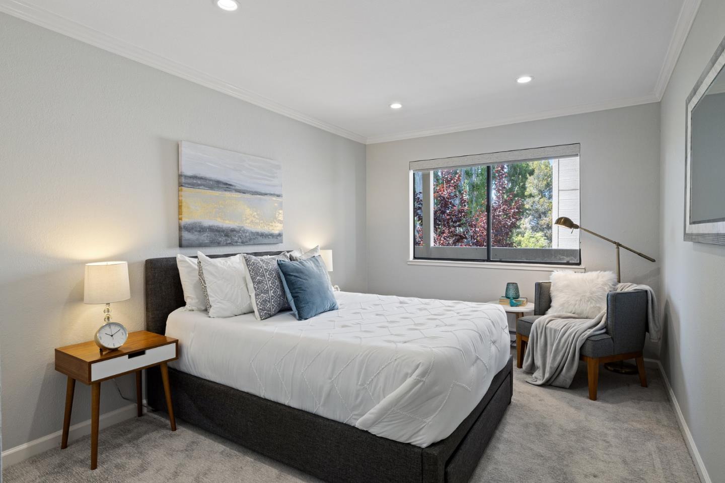 1171 Compass Lane, Unit 216 Foster City, CA 94404 - Photo 24 of 35 a bedroom with a large bed and a window