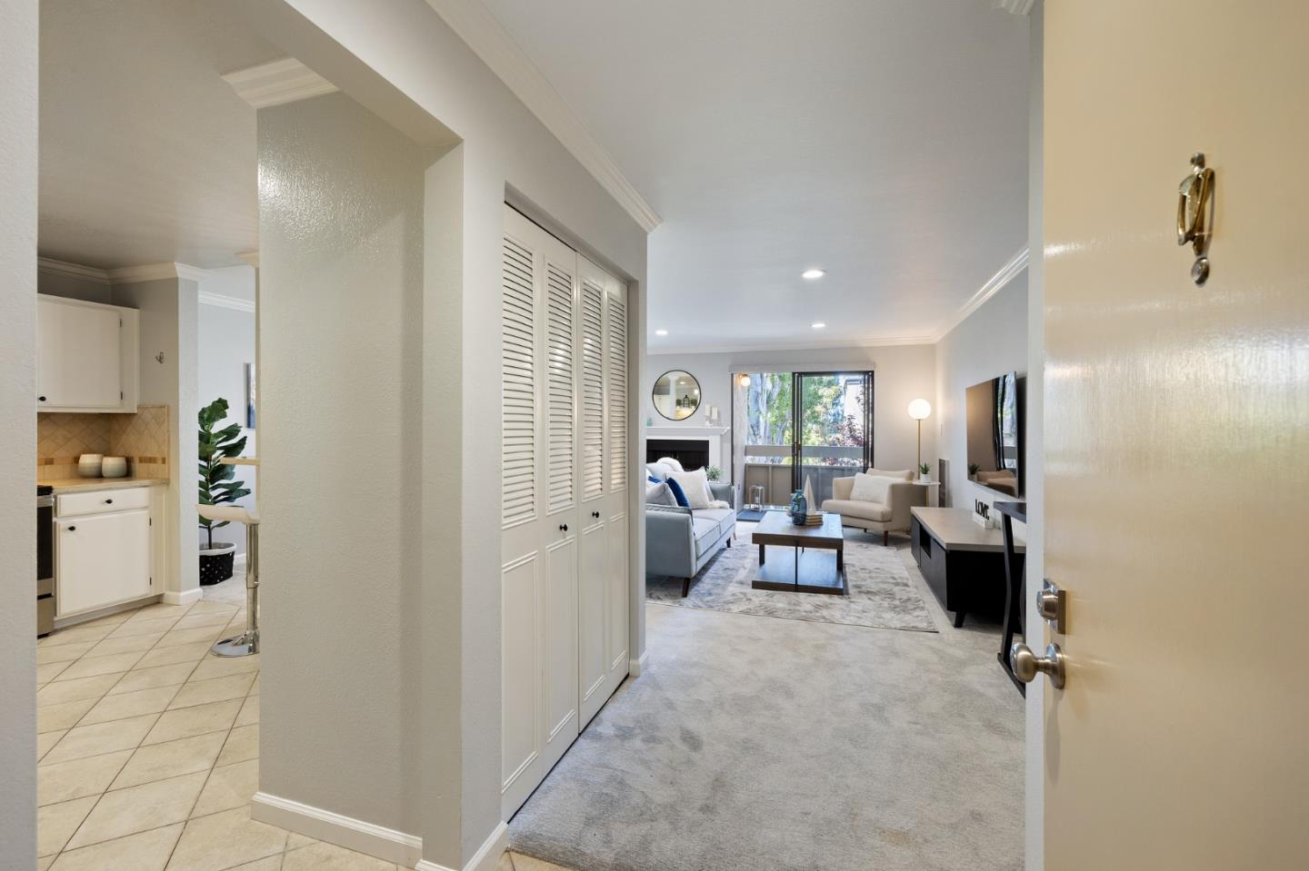 1171 Compass Lane, Unit 216 Foster City, CA 94404 - Photo 4 of 35 a living room with furniture and a table