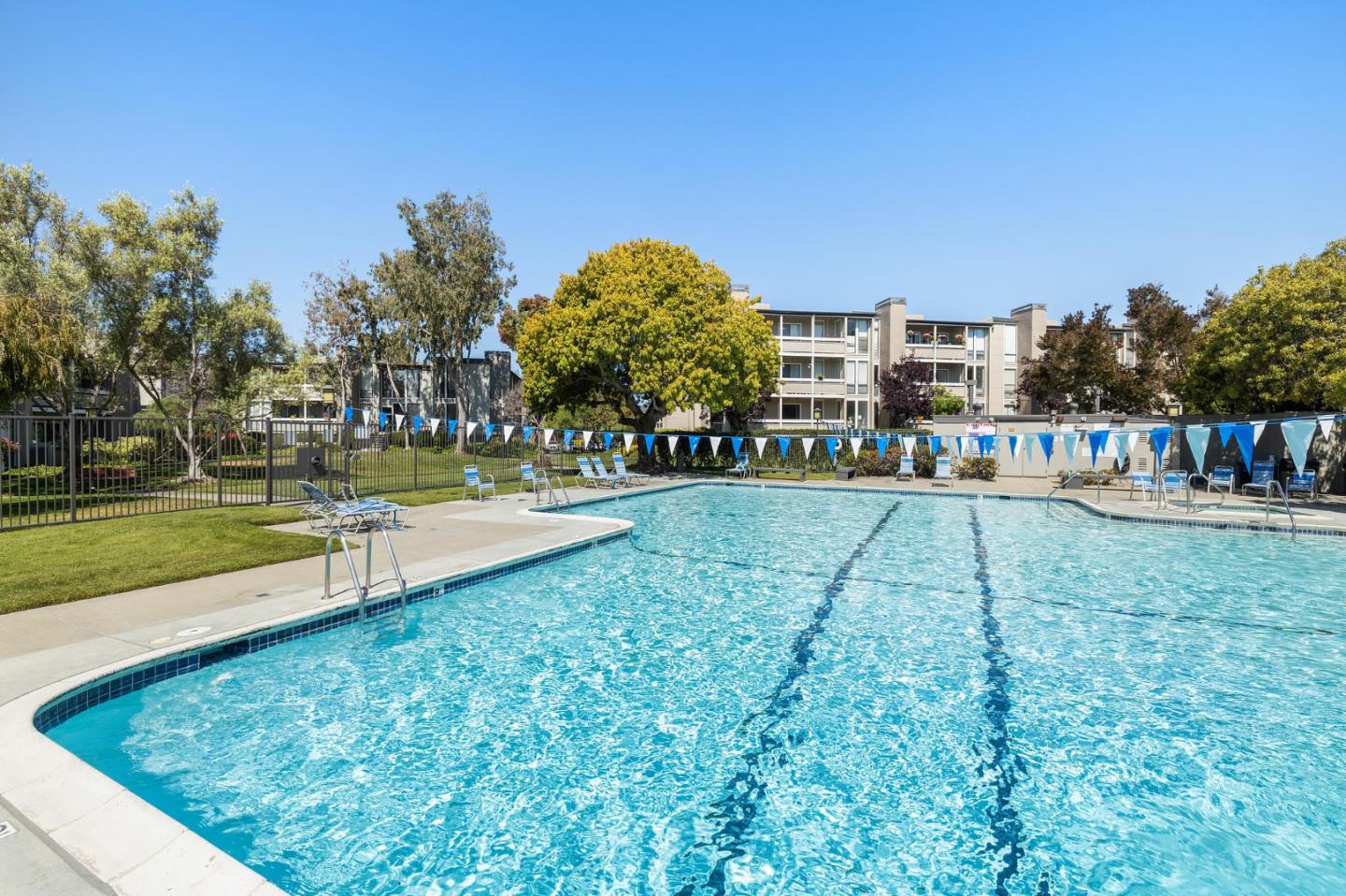 1171 Compass Lane, Unit 216 Foster City, CA 94404 - Photo 34 of 35 a view of swimming pool with a yard and sitting area