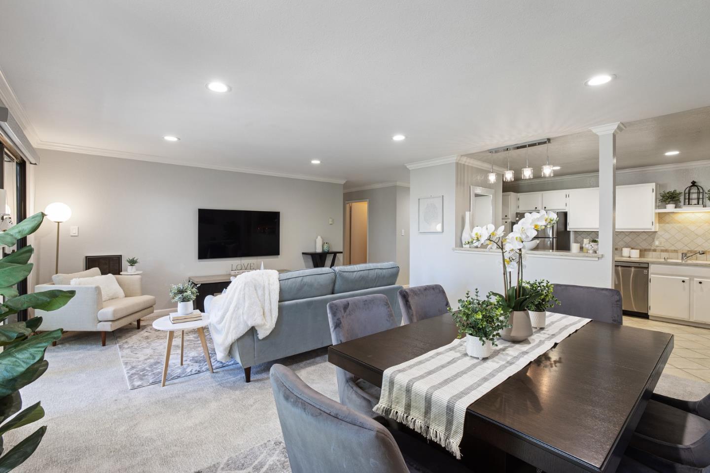 1171 Compass Lane, Unit 216 Foster City, CA 94404 - Photo 7 of 35 a view of a livingroom with furniture and a flat screen tv