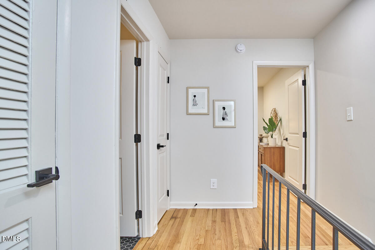 2613 McNeil Street, Unit B Raleigh, NC 27608 - Photo 20 of 31 a view of hallway with wooden floor