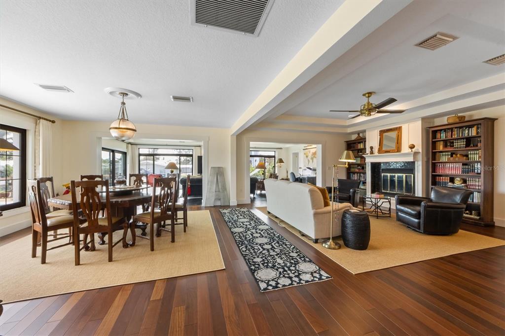 505 75th Street Holmes Beach, FL 34217 - Photo 12 of 75 a view of a dining room with furniture window and wooden floor