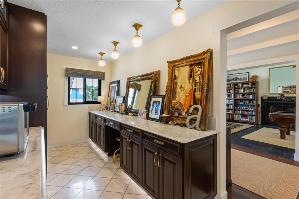 505 75th Street Holmes Beach, FL 34217 - Photo 20 of 75 a kitchen with a stove and a refrigerator