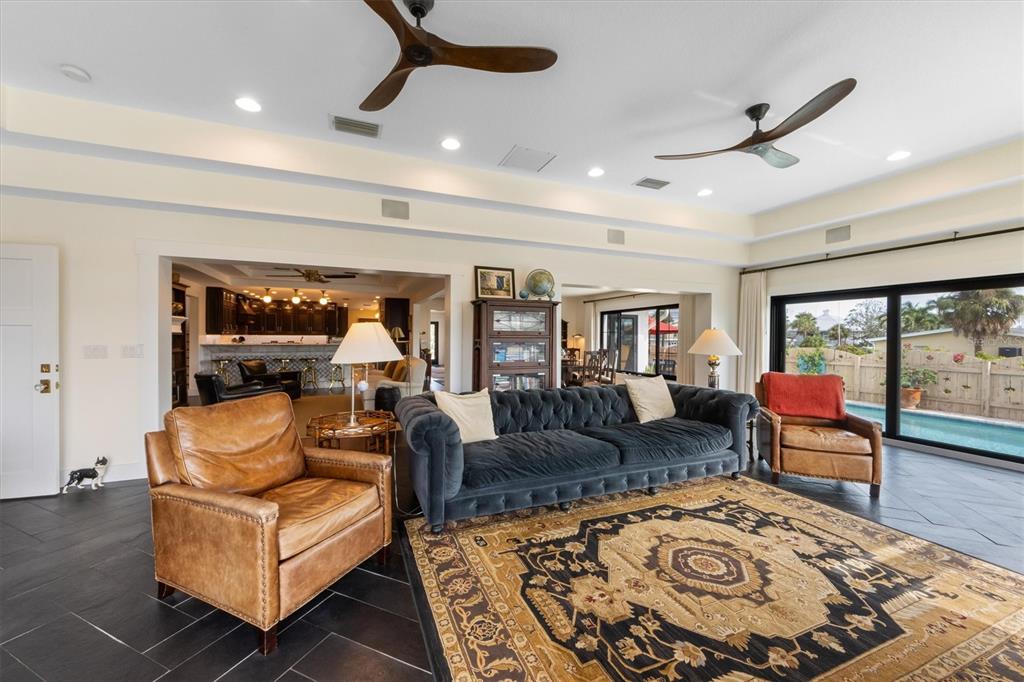 505 75th Street Holmes Beach, FL 34217 - Photo 27 of 75 a living room with furniture and a rug