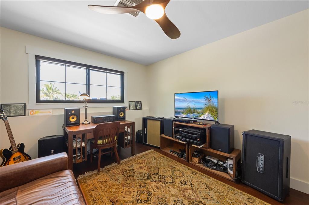 505 75th Street Holmes Beach, FL 34217 - Photo 47 of 75 a view of a workspace with furniture and a window