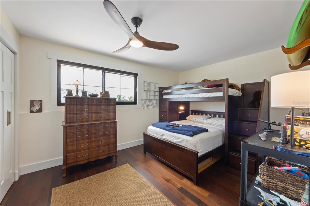 505 75th Street Holmes Beach, FL 34217 - Photo 51 of 75 a living room with furniture and a fireplace