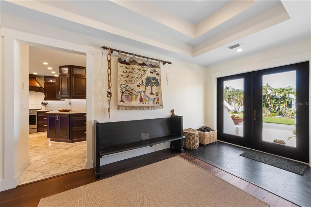 505 75th Street Holmes Beach, FL 34217 - Photo 8 of 75 a living room with furniture window and flat screen tv