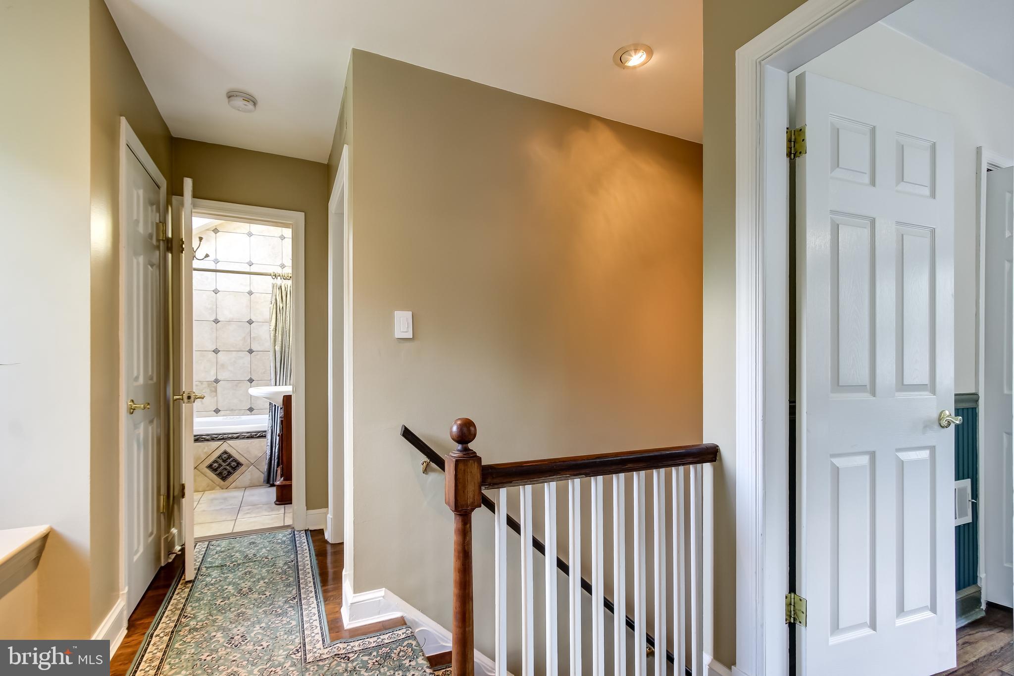 315 Penwood Road Silver Spring, MD 20901 - Photo 17 of 41 Upper level includes 3 bedrooms and 2 full baths.