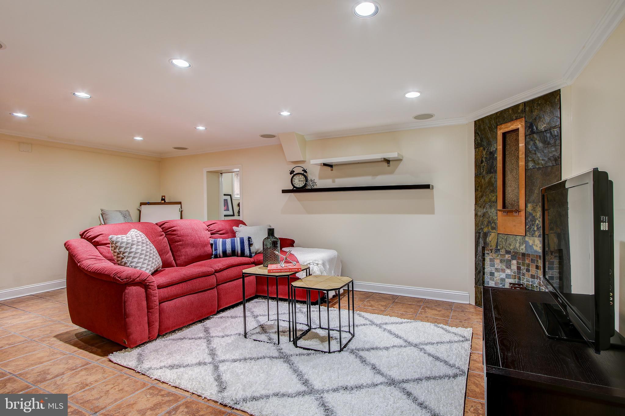 315 Penwood Road Silver Spring, MD 20901 - Photo 28 of 41 Lower level recreation room