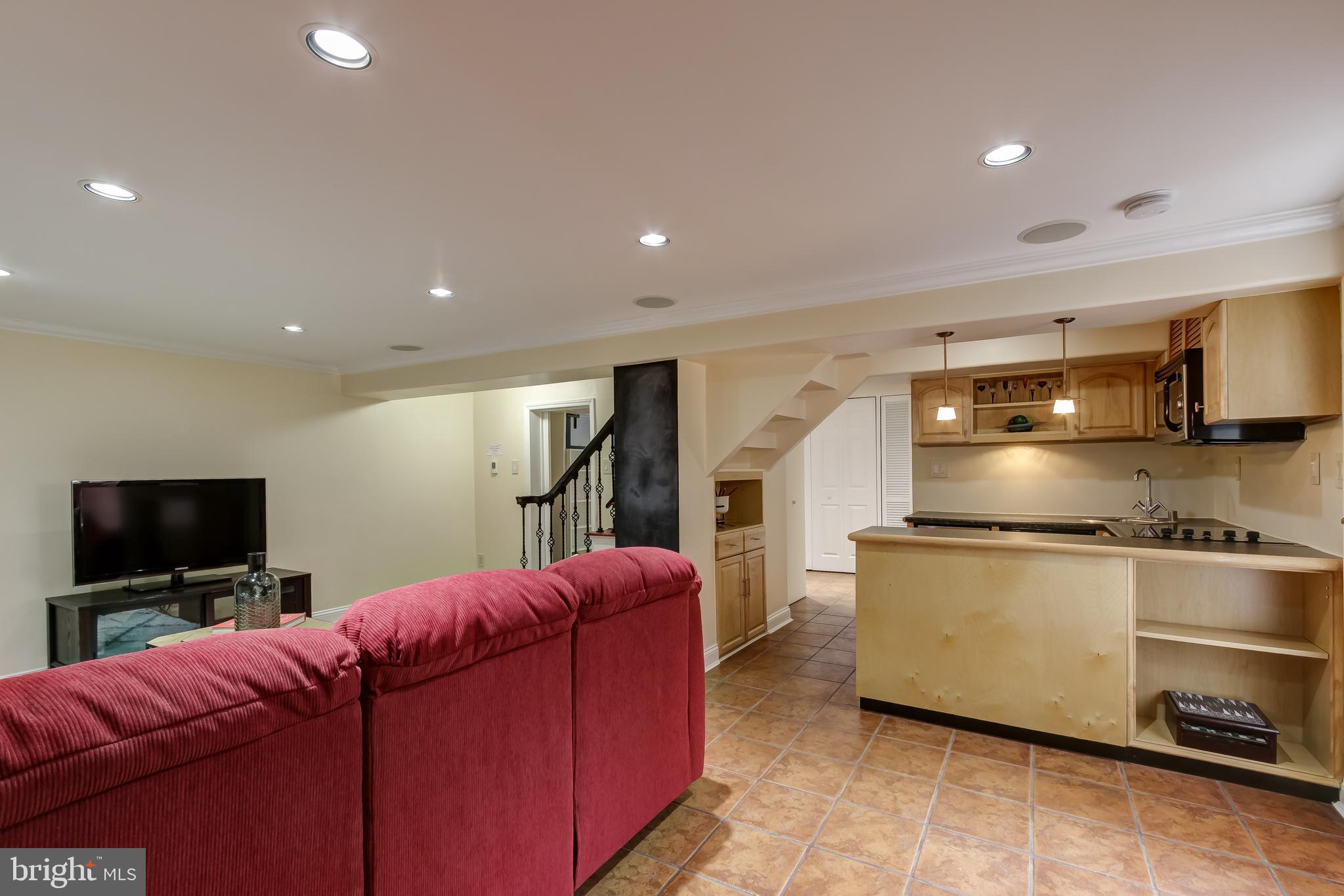 315 Penwood Road Silver Spring, MD 20901 - Photo 30 of 41 Lower level with dual zoned heated flooring