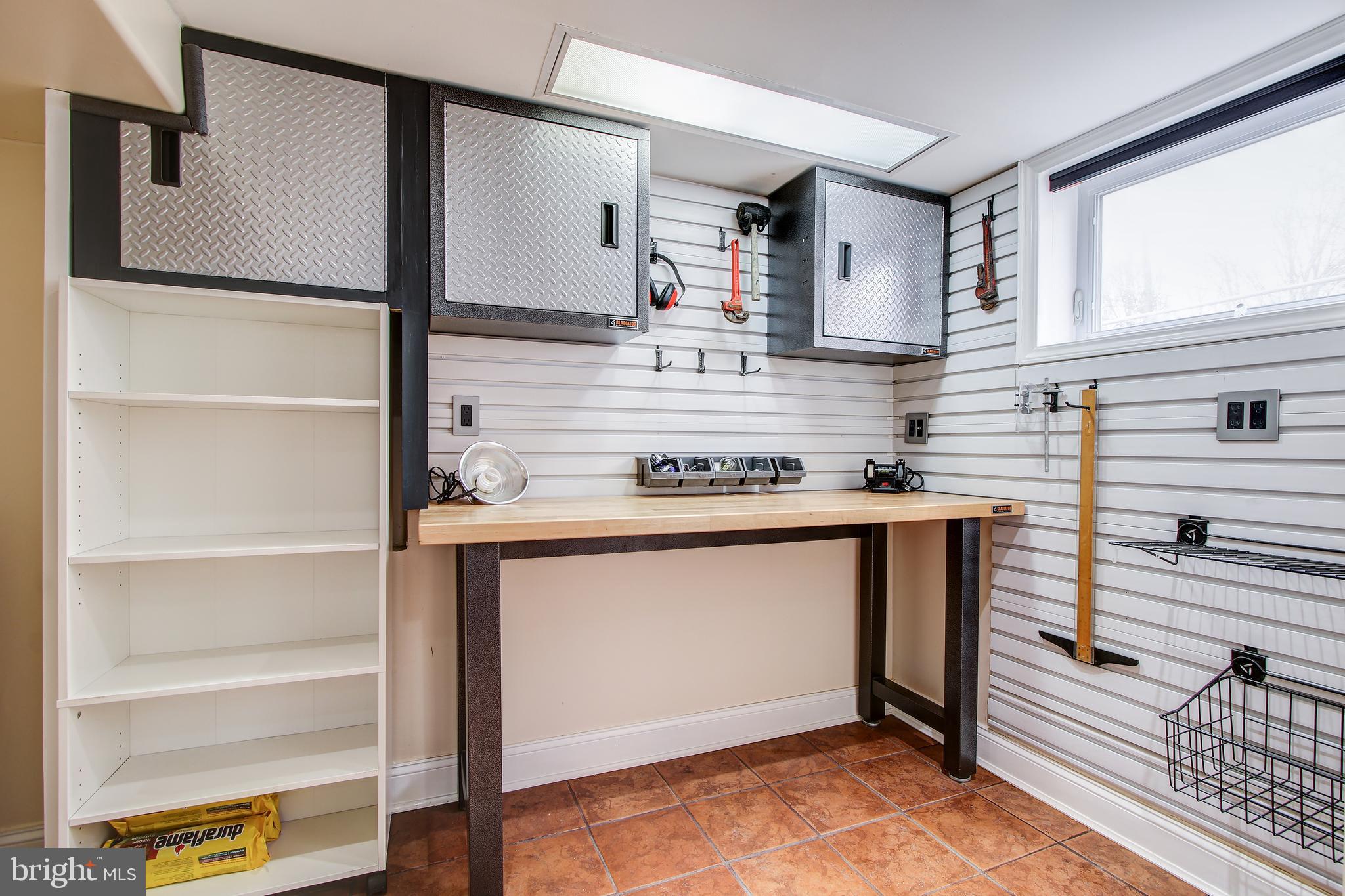 315 Penwood Road Silver Spring, MD 20901 - Photo 33 of 41 Workshop. Space includes 2nd laundry hookups