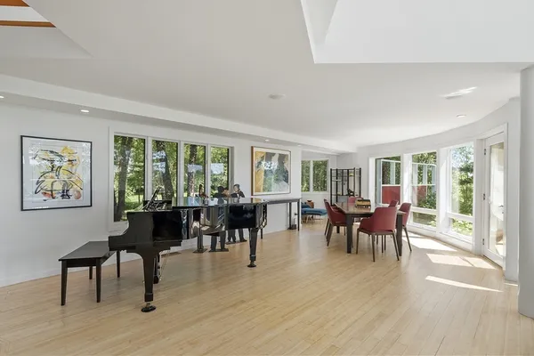 a view of a dining room with furniture window and outside view