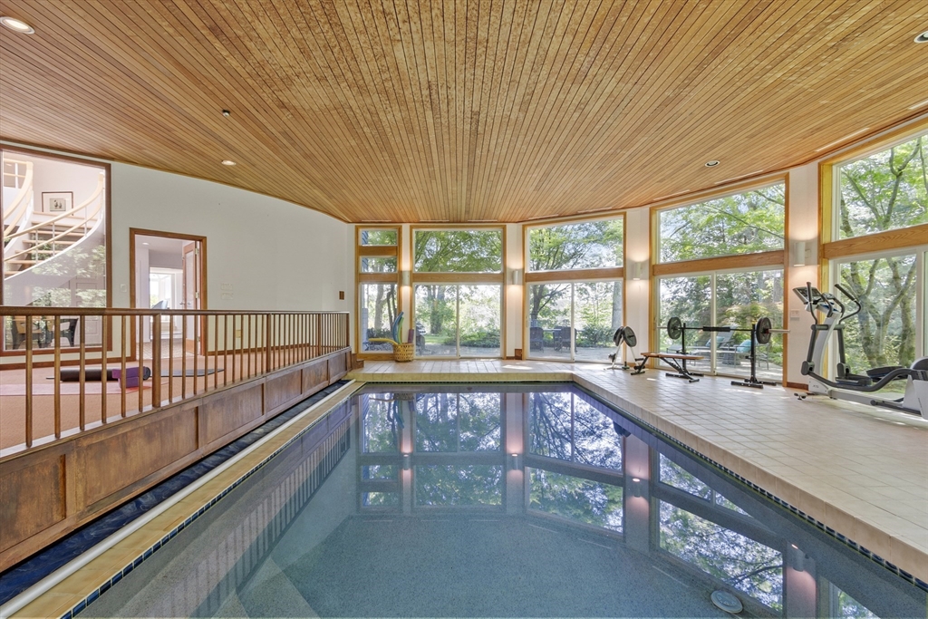 389 River Road Carlisle, MA 01741 - Photo 23 of 42 a view of a room with large windows