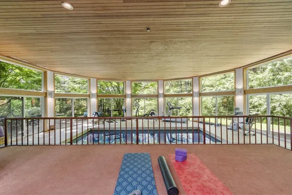 a view of a bedroom with a balcony