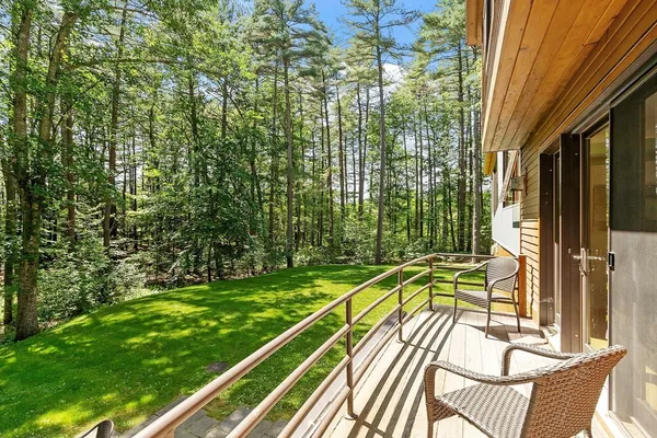 a view of a balcony with a patio
