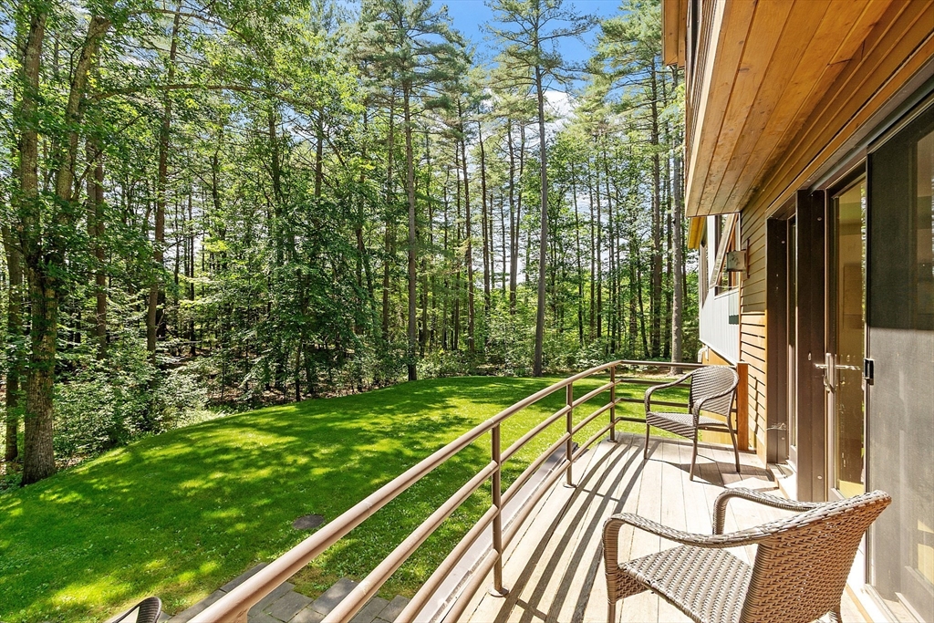389 River Road Carlisle, MA 01741 - Photo 41 of 42 a view of a balcony with a patio