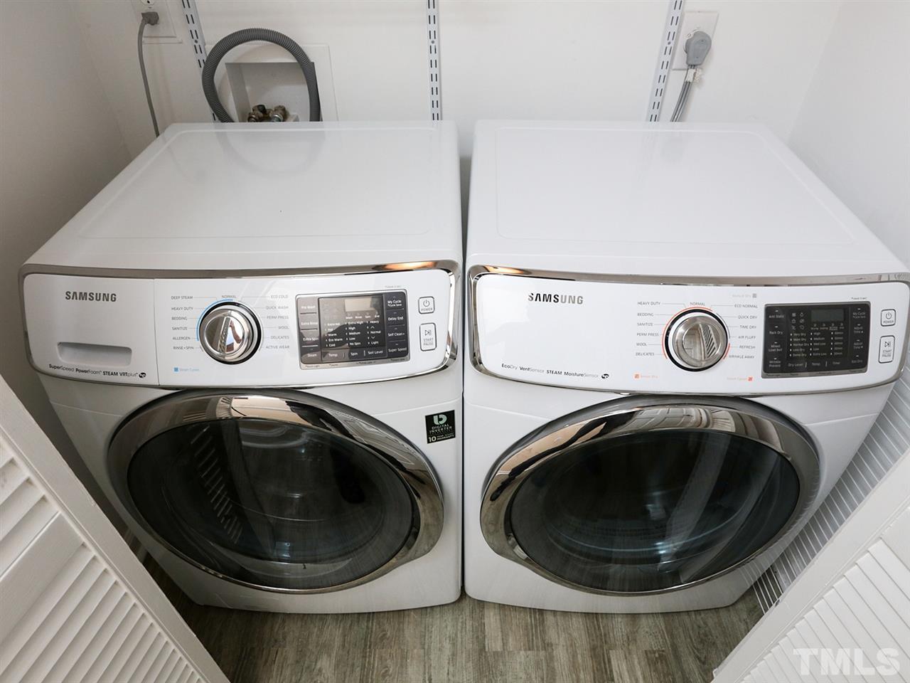 7316 Harps Mill Road Raleigh, NC 27615 - Photo 20 of 25 a utility room with dryer and washer
