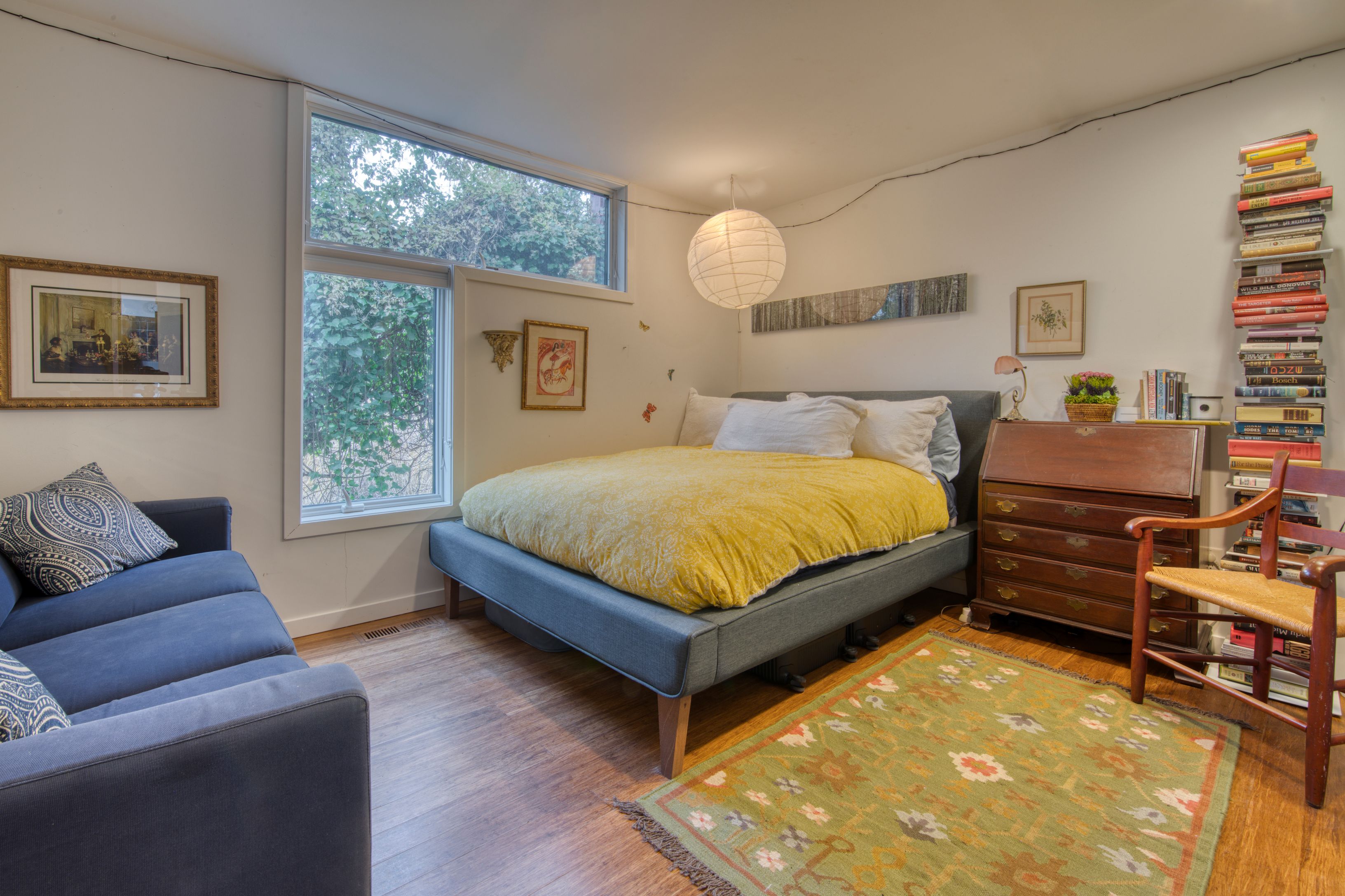 Undisclosed Address Sag Harbor, NY 11963 - Photo 11 of 18 a bedroom with a bed window and couch