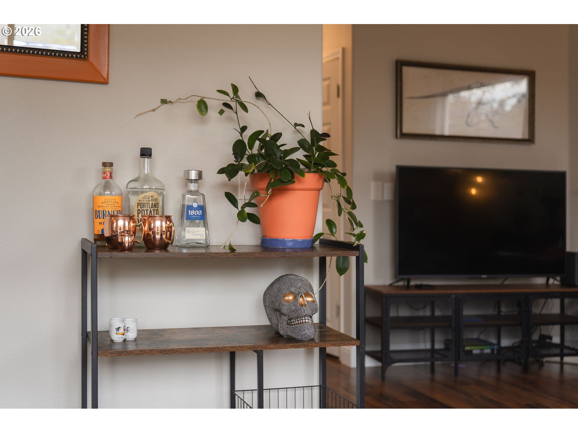 8330 Southwest Norfolk Lane Portland, OR 97224 - Photo 12 of 37 a living room with furniture and a flat screen tv
