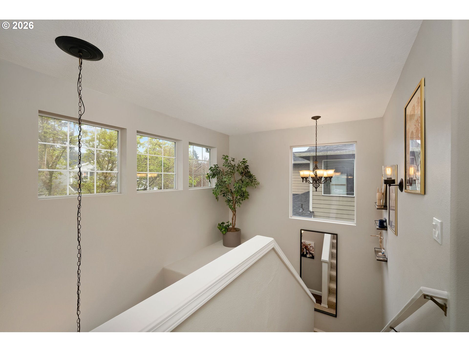 8330 Southwest Norfolk Lane Portland, OR 97224 - Photo 19 of 37 a view of hallway with wooden floor