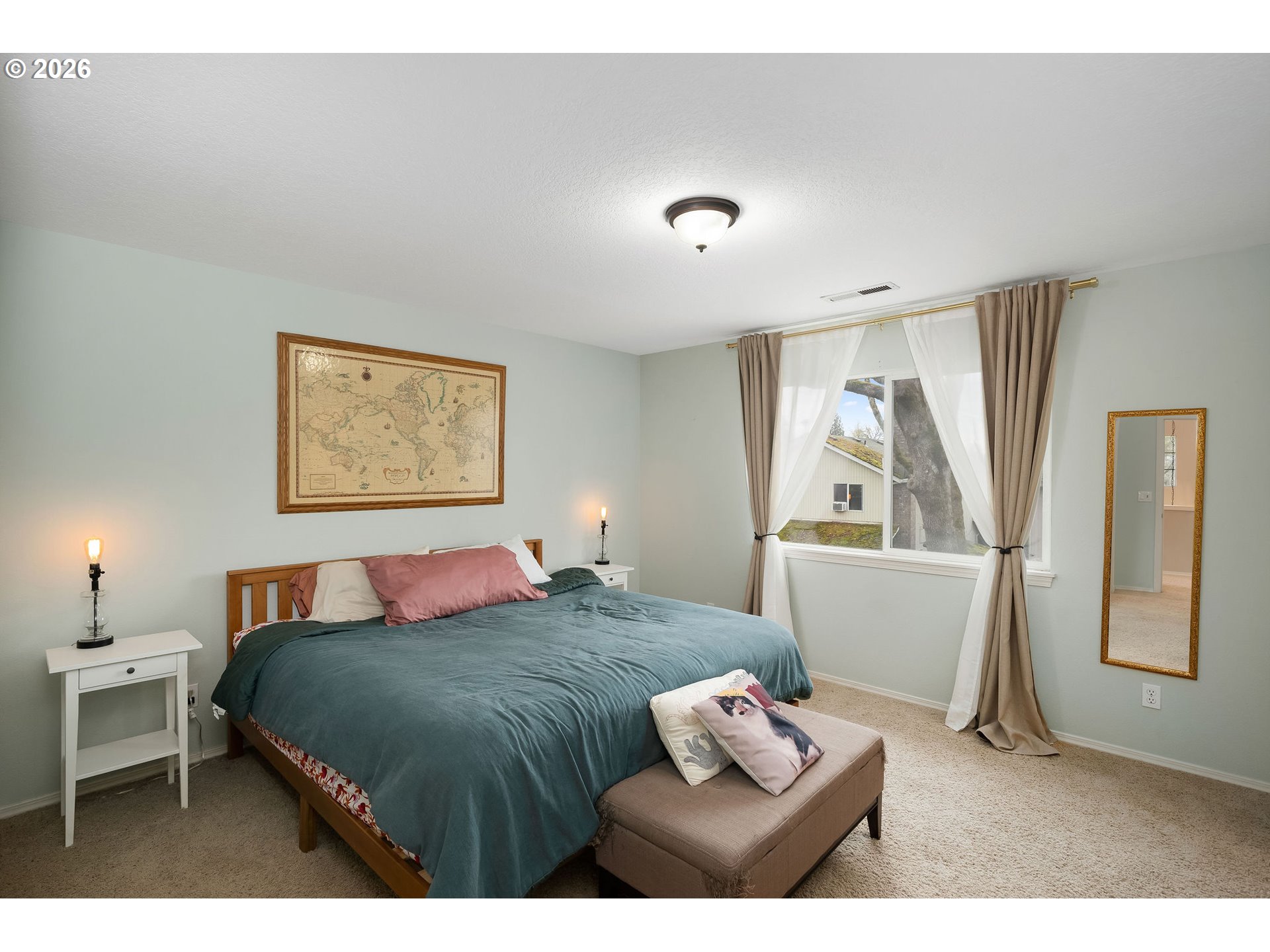 8330 Southwest Norfolk Lane Portland, OR 97224 - Photo 20 of 37 a bedroom with a bed and a couch