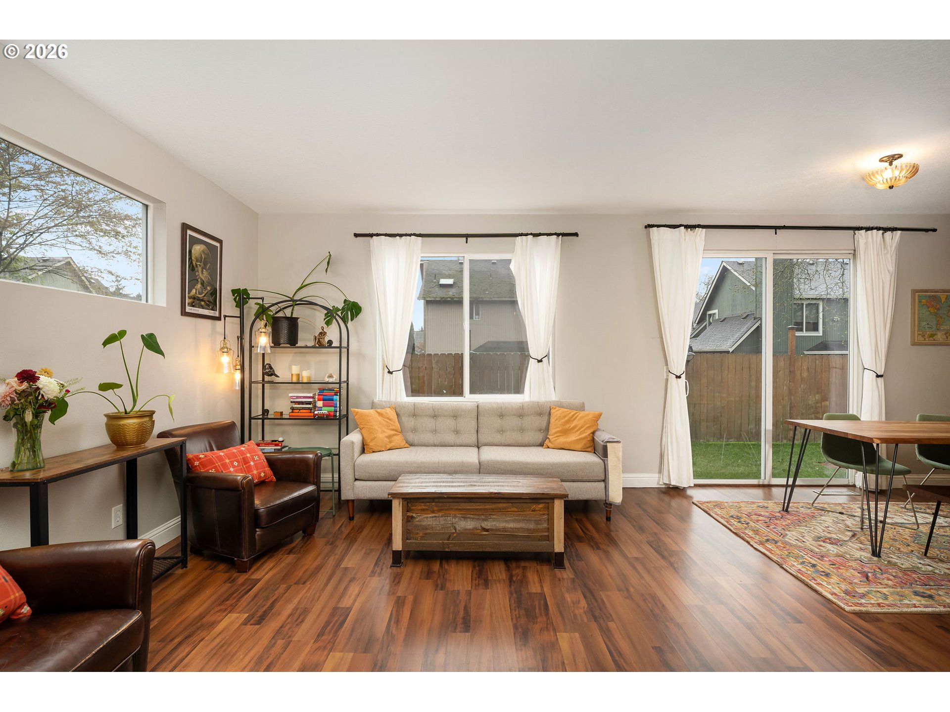 8330 Southwest Norfolk Lane Portland, OR 97224 - Photo 2 of 37 a living room with furniture and a wooden floor