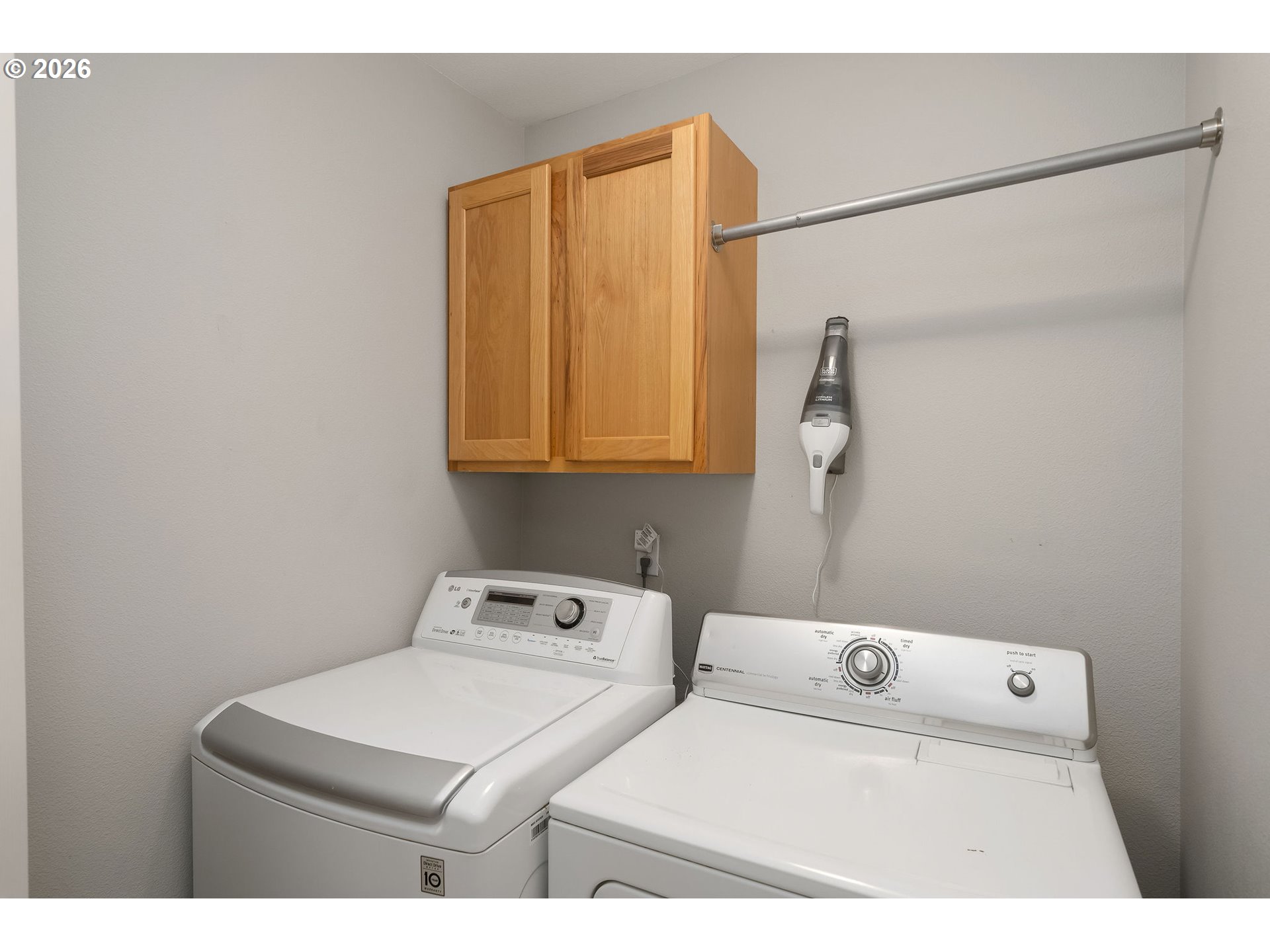 8330 Southwest Norfolk Lane Portland, OR 97224 - Photo 25 of 37 a utility room with dryer and washer