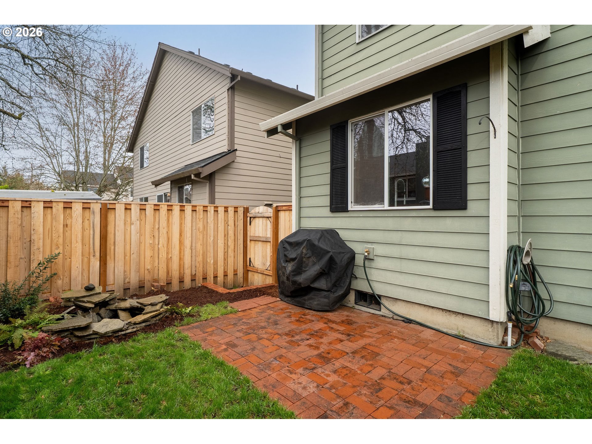 8330 Southwest Norfolk Lane Portland, OR 97224 - Photo 30 of 37 a view of a house with backyard and porch