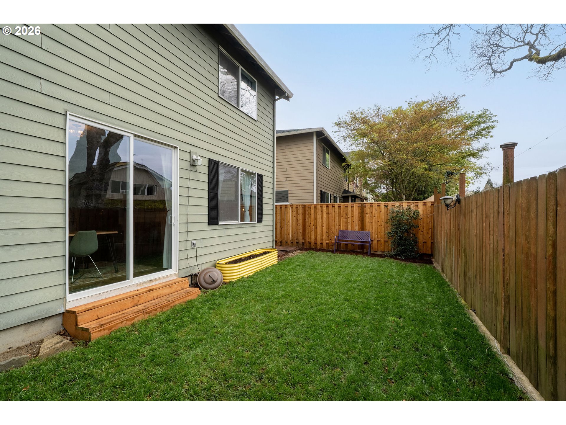 8330 Southwest Norfolk Lane Portland, OR 97224 - Photo 32 of 37 a view of a house with backyard and porch
