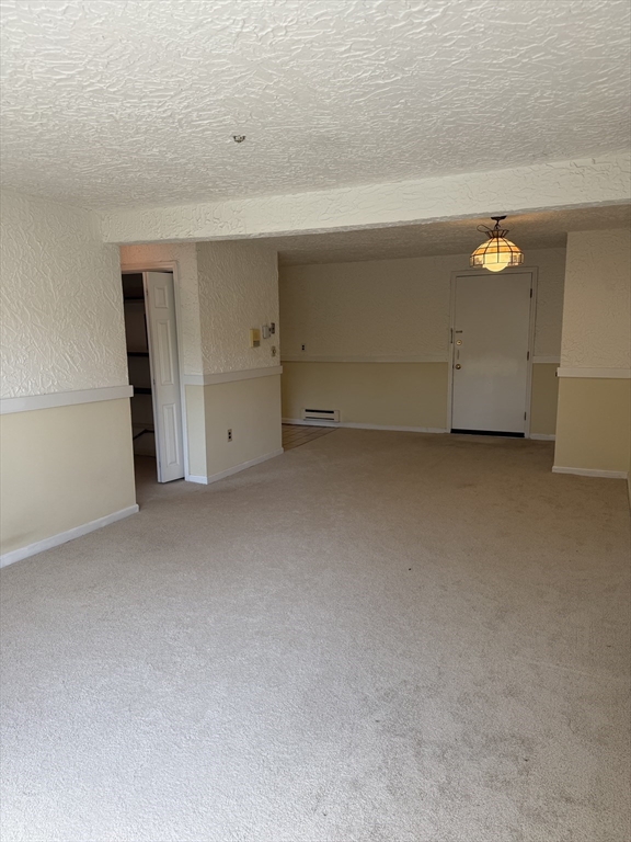 310 Codman Hill Road, Unit 34D Boxborough, MA 01719 - Photo 15 of 17 a view of an empty room