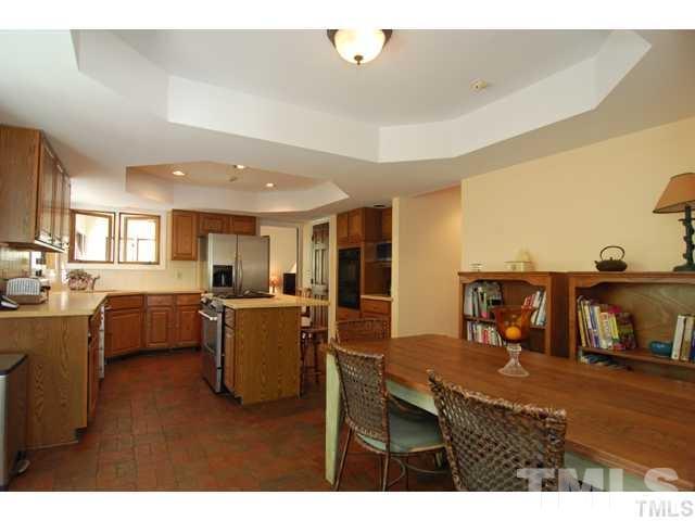 1061 Beaver Dam Road Chapel Hill, NC 27517 - Photo 15 of 19 a living room with furniture and a flat screen tv