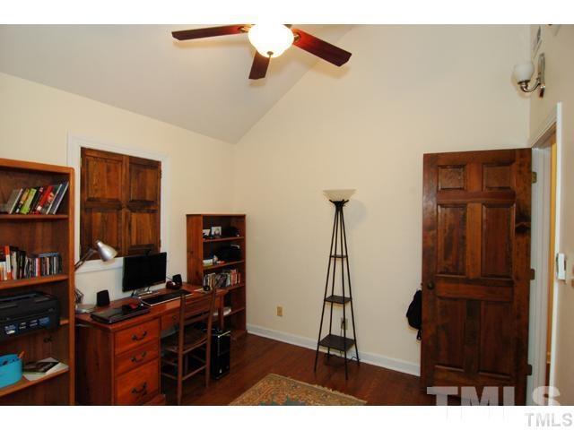 1061 Beaver Dam Road Chapel Hill, NC 27517 - Photo 7 of 19 a living room with furniture and a flat screen tv