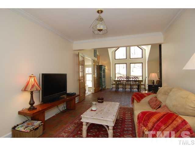 1061 Beaver Dam Road Chapel Hill, NC 27517 - Photo 9 of 19 a living room with furniture and a flat screen tv